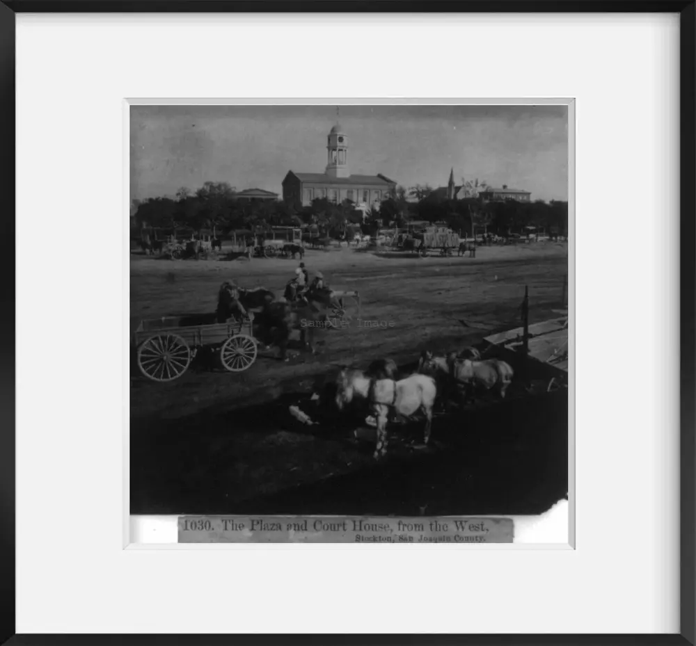 1866 Photo Wagon groups parked on the Plaza with Court Houtilize in background. from